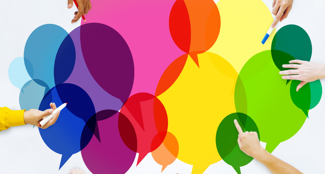 Chat bubbles with hands around the perimeter